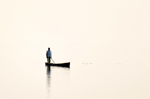 The Congo river is enormous, stretching almost to the murky horizon on both sides.