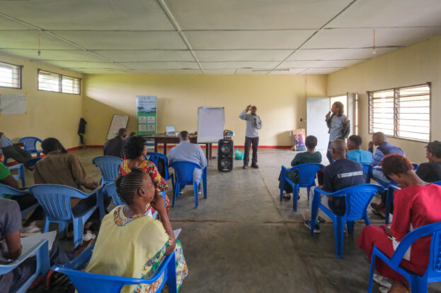 Participants listen to a presentation during a NutriScapes workshop on nutrition and food systems in Yangambi, Democratic Republic of the Congo.