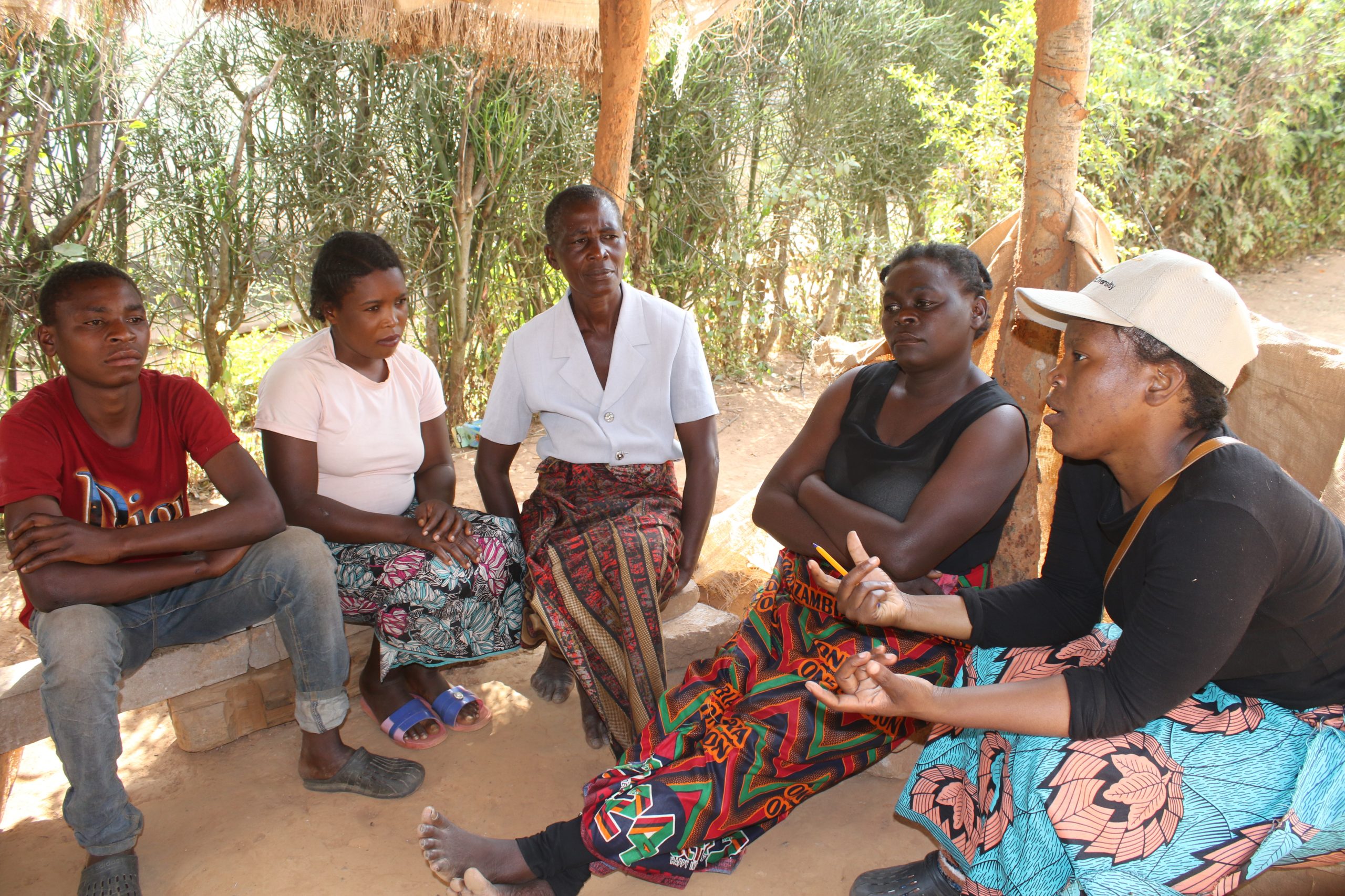 Stakeholders discussing observed changes in forests and fish along the Kafue River, Zambia. Photo by Joe Nkadanni.