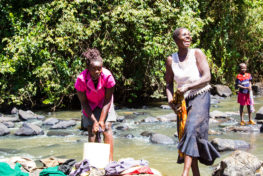 women, kenya women, wash clothes in river, river and water management, river, water towers, forest management, community participation research,