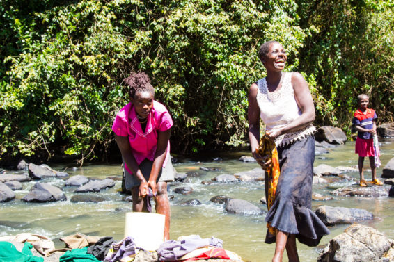 women, kenya women, wash clothes in river, river and water management, river, water towers, forest management, community participation research,