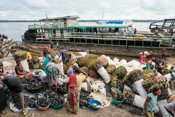 Producers from Yanonge prepare a charcoal shipment