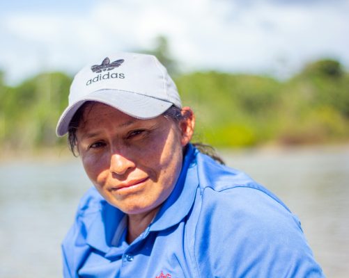 Susan, working hard in the midday sun to catch, measure and safely release fish during the assessment with colleagues from the North Rupununi District Development Board. Photo by Luke McKenna/FAO