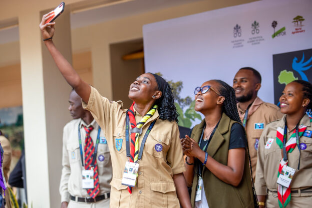 Smiling youth delegates taking a selfie at the Resilient Africa Summit in Nairobi, where young leaders championed Africa climate resilience.