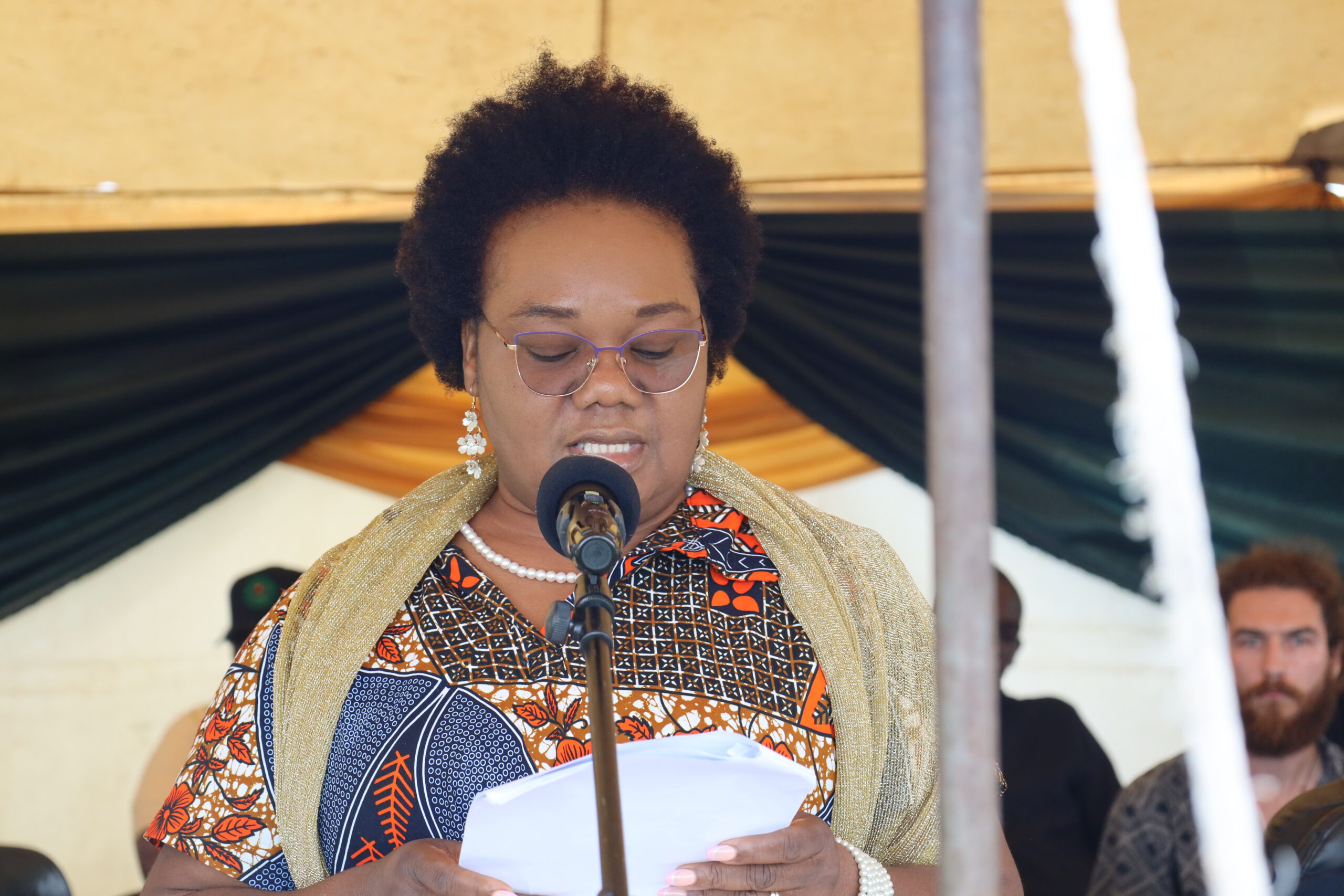Yolanta Mutyambe Malunga speaks at a podium during the International Day of Forests event.