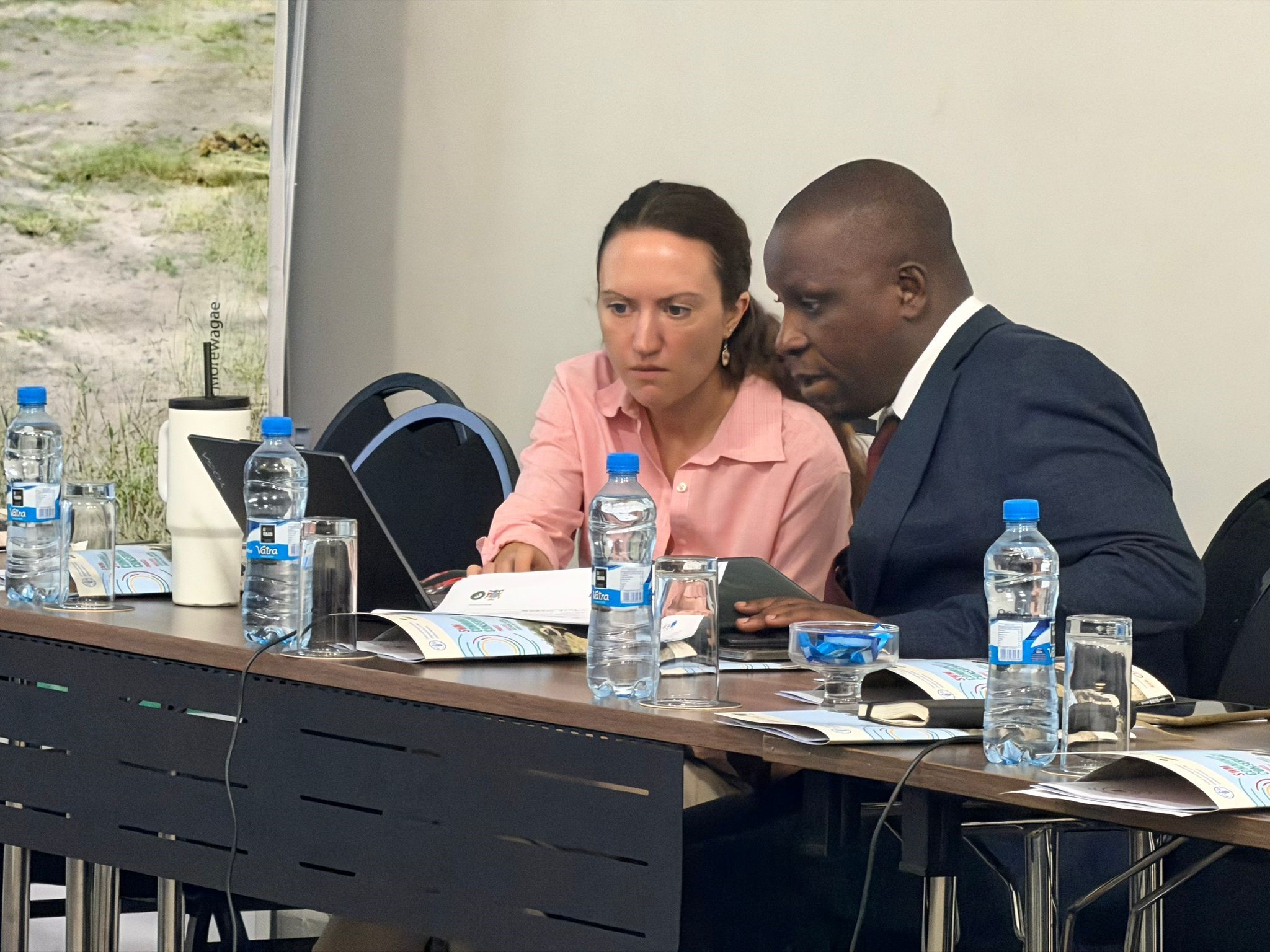 Legal consultants Kelsey Galantich and Morgan Katati at the SWM Programme technical meeting.