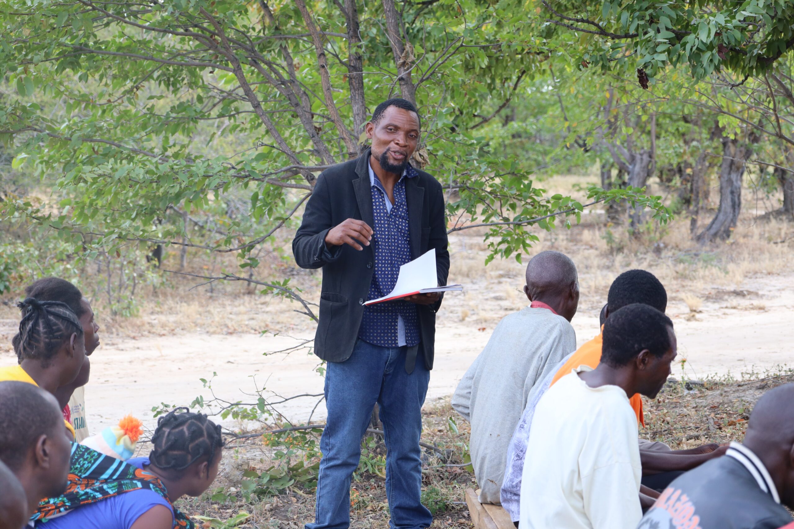 Mosten Munsaka addressing community members during an animal disease surveillance meeting