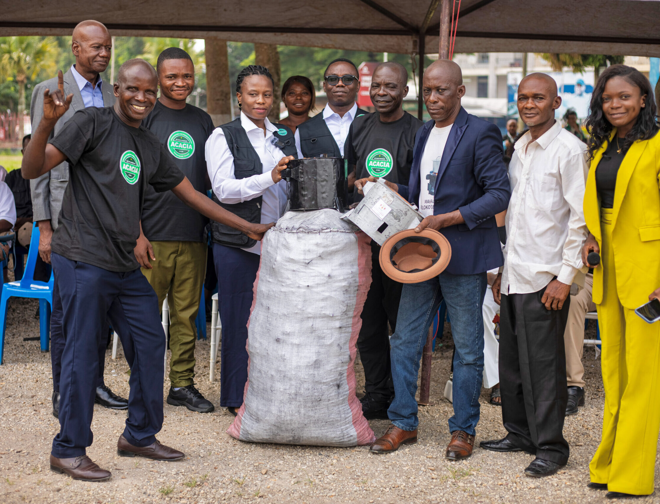 Community leaders and project participants gather during an awareness campaign on renewable charcoal and sustainable woodfuel in Kisangani.