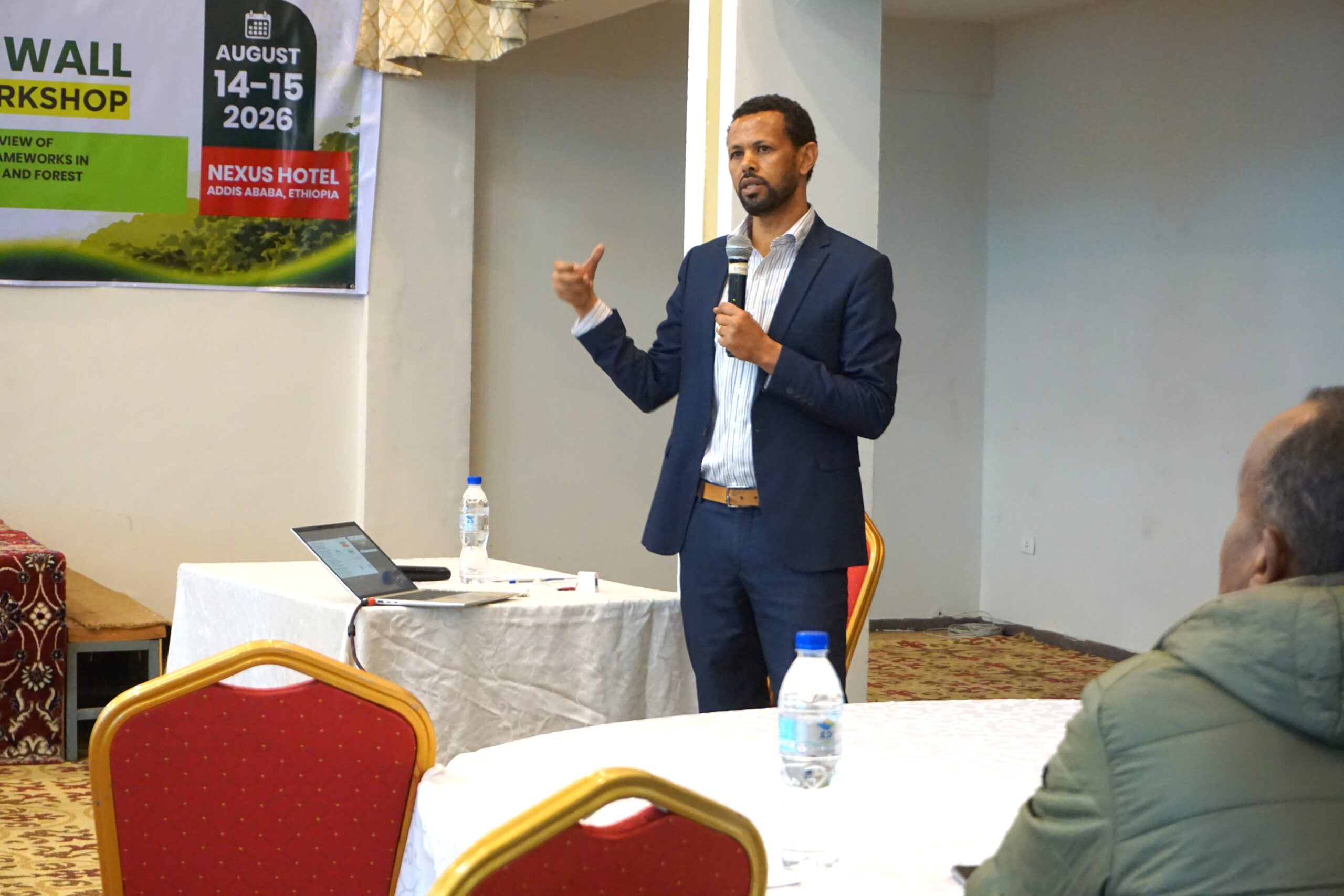 Niguse Hagazi speaks to workshop participants during a presentation at the National Great Green Wall Consultation Workshop in Addis Ababa.