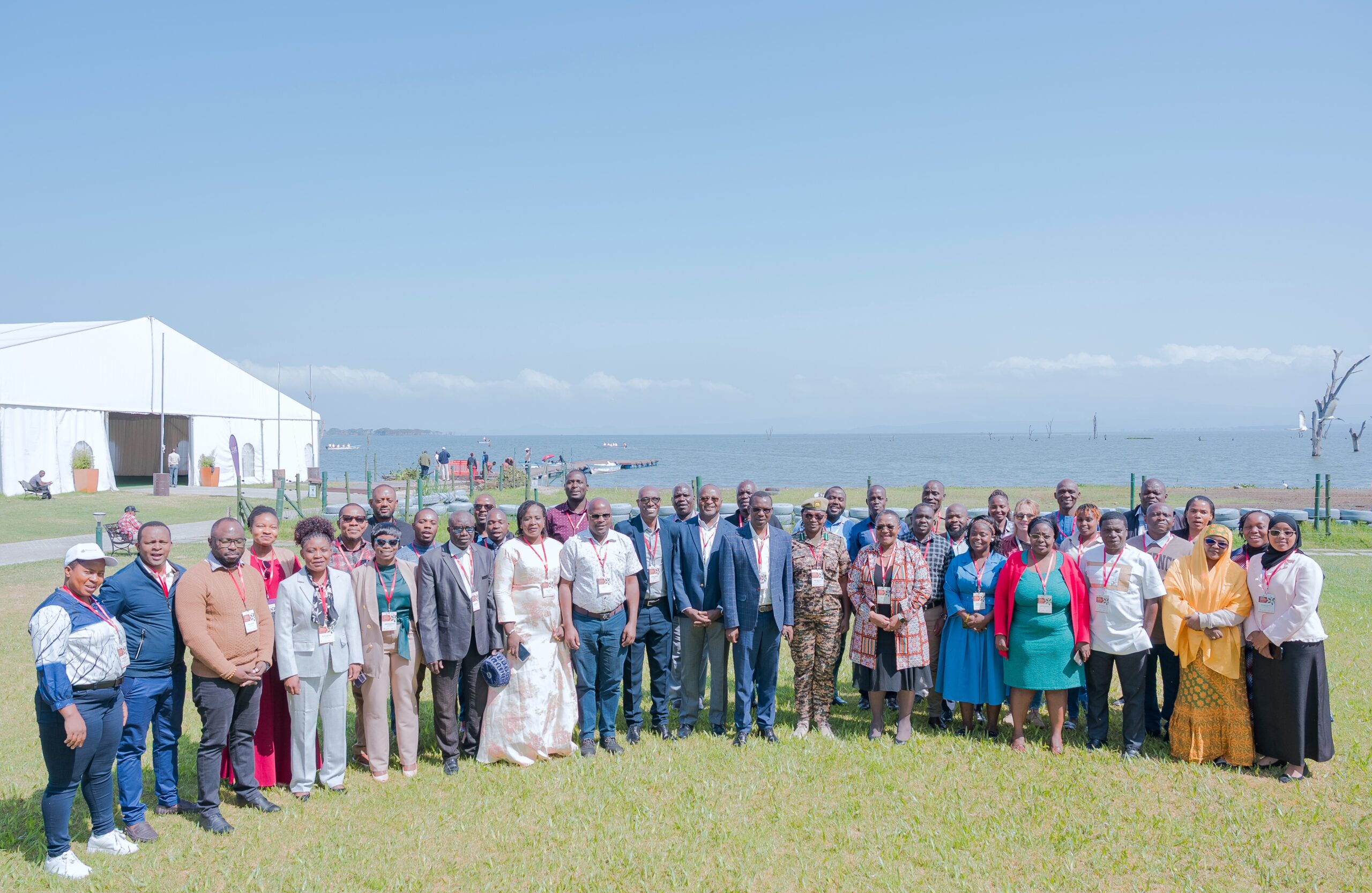 Participants from multiple countries pose for a group photo at an IMET coaches’ training workshop held in Kenya.