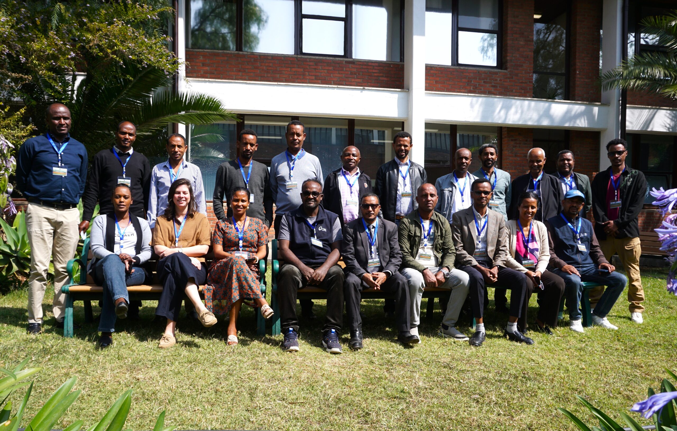 Group photo of training participants and facilitators outside a building in Ethiopia during Regreening Africa II activities.