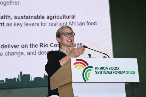 Dr Leigh Ann Winowiecki speaks at a podium during a side event on soil health at the Africa Food Systems Forum 2025 in Dakar, Senegal.