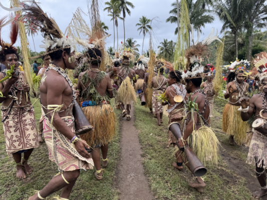 Local performers dancing during the Combined Forum in Kawowogi Village on the Managalas Plateau in Papua New Guinea, where clans meet to discuss conservation and sustainable livelihoods.