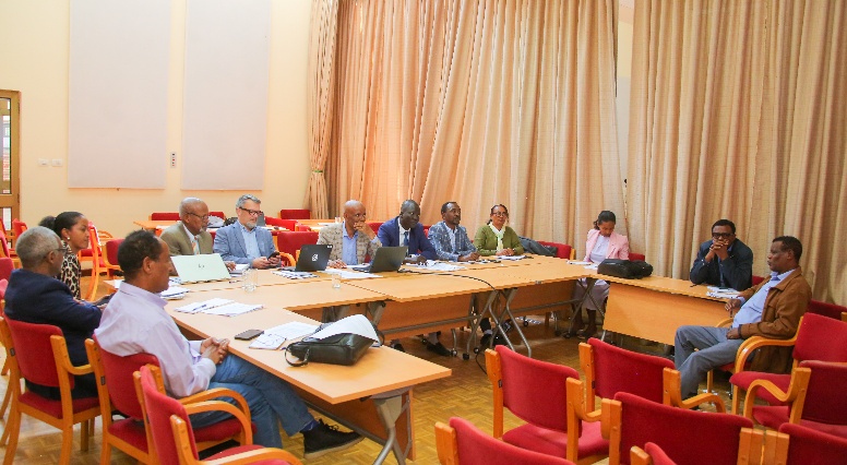 Stakeholders seated around tables in small groups discussing Ethiopia’s draft National Agroecology Strategy during a consultation workshop in Addis Ababa.